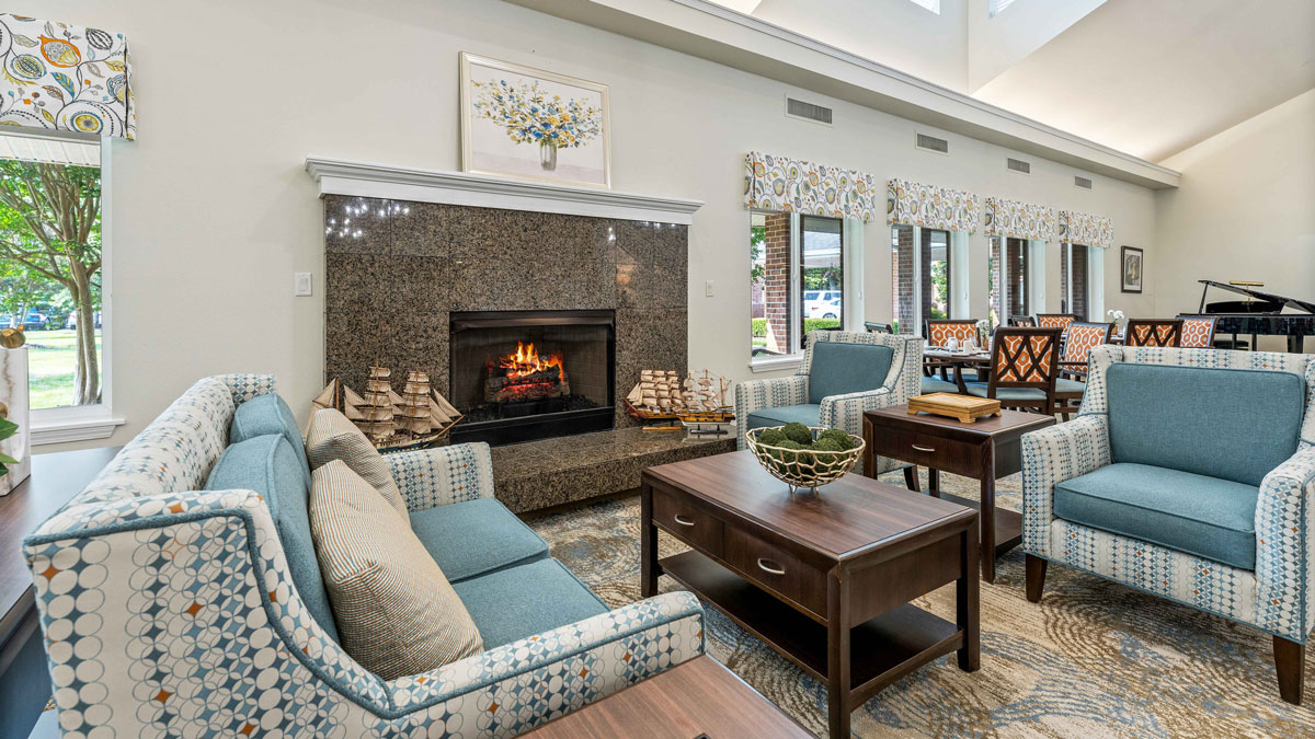 A cozy fireplace lounge at Colonial Harbor